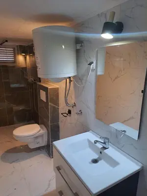 Kupaonica u objektu Apartmani Ana