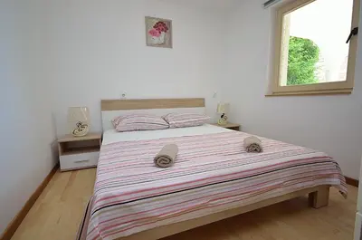 Krevet ili kreveti u jedinici u objektu Apartmani Ana