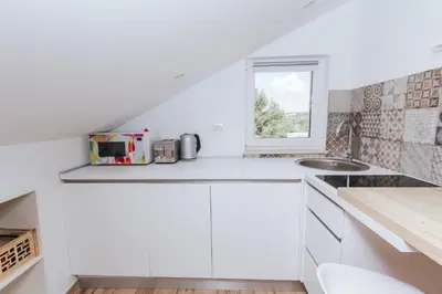 Kuhinja ili čajna kuhinja u objektu Fyaka Loft Apartments