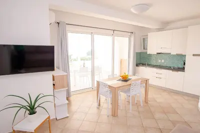 TV i/ili zabavni centar u objektu Exclusive Seaside Dream Apartments