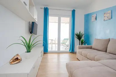 TV i/ili zabavni centar u objektu Exclusive Seaside Dream Apartments
