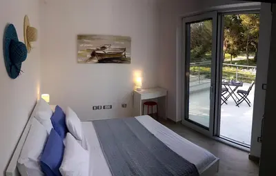Krevet ili kreveti u jedinici u objektu Villa Big Blue, Tisno