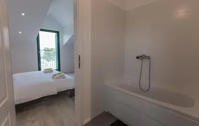 Krevet ili kreveti u jedinici u objektu Relaxing whole top floor apartment by the sea