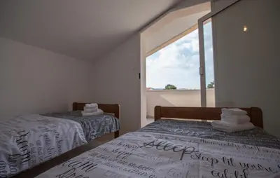 Krevet ili kreveti u jedinici u objektu Relaxing whole top floor apartment by the sea