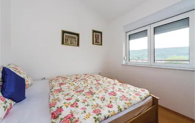 Krevet ili kreveti u jedinici u objektu Three-Bedroom Apartment In Bilice