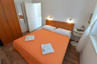 Krevet ili kreveti u jedinici u objektu Beach apartment VAMI with sea view