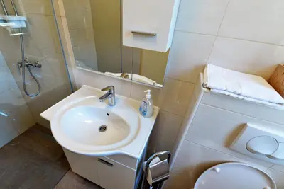 Kupaonica u objektu Beach apartment VAMI with sea view