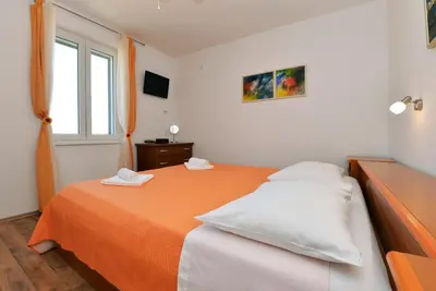 Krevet ili kreveti u jedinici u objektu Beach apartment VAMI with sea view