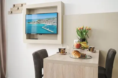 TV i/ili zabavni centar u objektu Apartment Remy