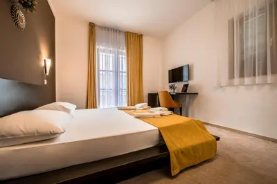Krevet ili kreveti u jedinici u objektu Hotel Nikola