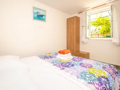 Krevet ili kreveti u jedinici u objektu Holiday Home Snježana by Interhome