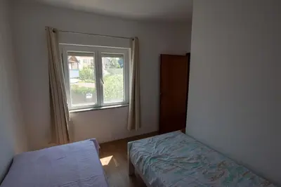 Krevet ili kreveti u jedinici u objektu Apartments Roko i Niko