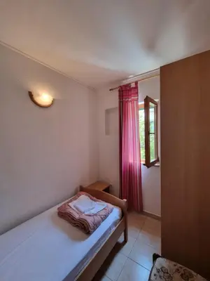 Krevet ili kreveti u jedinici u objektu APARTMANI TONI POCE 2
