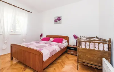 Krevet ili kreveti u jedinici u objektu Awesome Home In Unesic