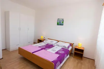 Krevet ili kreveti u jedinici u objektu Apartments Ksenija