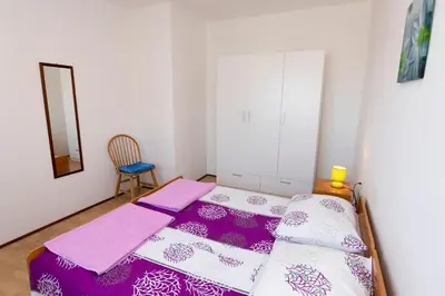 Krevet ili kreveti u jedinici u objektu Apartments Ksenija