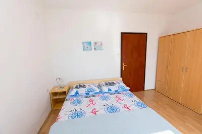 Krevet ili kreveti u jedinici u objektu Apartments Ksenija