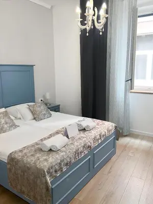 Krevet ili kreveti u jedinici u objektu Centrum Luxury Rooms
