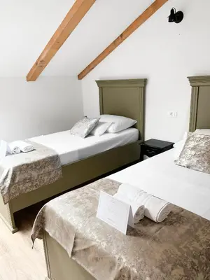 Krevet ili kreveti u jedinici u objektu Centrum Luxury Rooms