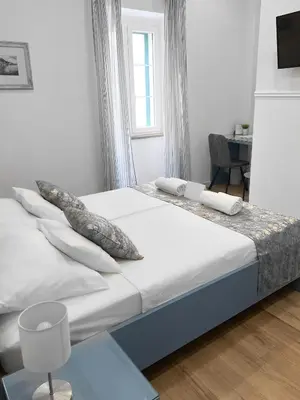 Krevet ili kreveti u jedinici u objektu Centrum Luxury Rooms