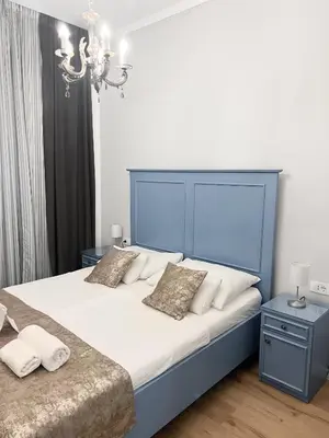 Krevet ili kreveti u jedinici u objektu Centrum Luxury Rooms