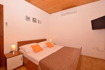 Krevet ili kreveti u jedinici u objektu Apartments Andrija