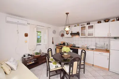 Kuhinja ili čajna kuhinja u objektu House Green Paradise