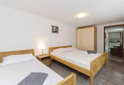 Krevet ili kreveti u jedinici u objektu Apartments Crystal
