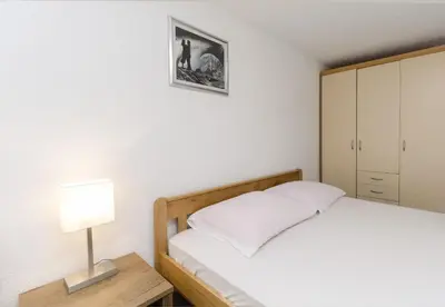 Krevet ili kreveti u jedinici u objektu Apartments Crystal
