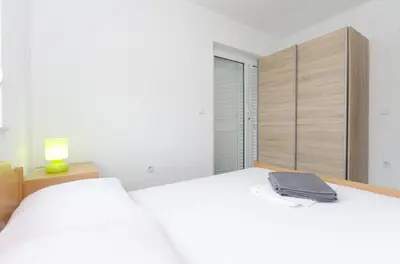 Krevet ili kreveti u jedinici u objektu Apartments Crystal