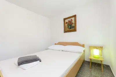 Krevet ili kreveti u jedinici u objektu Apartments Crystal