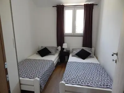 Krevet ili kreveti u jedinici u objektu Apartmani Luka
