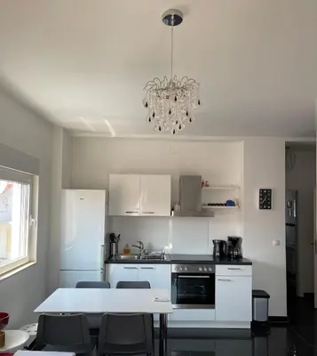 Kuhinja ili čajna kuhinja u objektu Apartments Leonardo