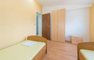 Krevet ili kreveti u jedinici u objektu Apartments Lord Pirovac