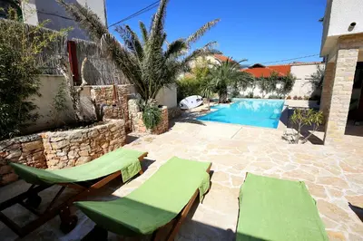 Bazen u objektu Murter-Center, studio for 2 with sauna &Jacuzzi id 678 ili u blizini