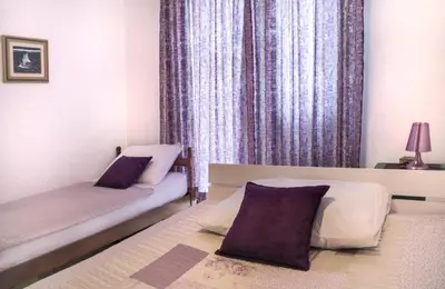 Krevet ili kreveti u jedinici u objektu Apartments with parking space Rogoznica - 15876