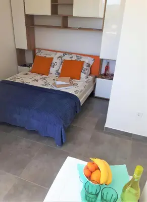 Krevet ili kreveti u jedinici u objektu Apartmani Dalmacjia