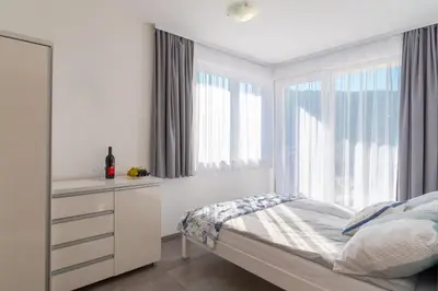 Krevet ili kreveti u jedinici u objektu Apartmani Dalmacjia