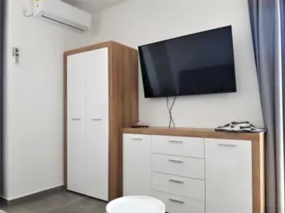 TV i/ili zabavni centar u objektu Apartmani Dalmacjia