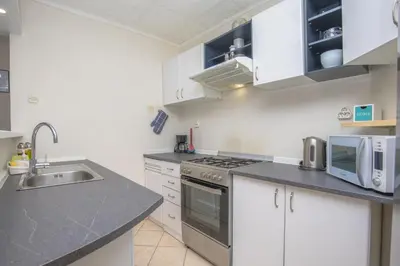 Kuhinja ili čajna kuhinja u objektu Apartmani Jurin