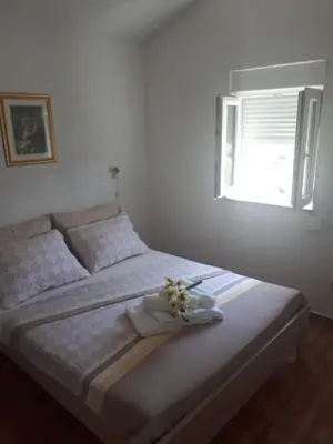 Krevet ili kreveti u jedinici u objektu Apartments Ante-Gojko