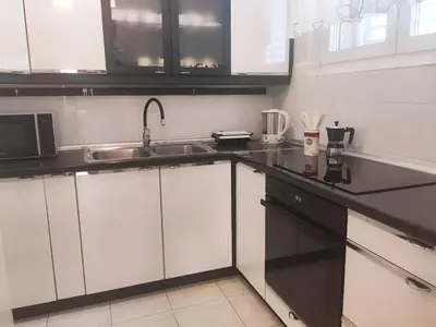 Kuhinja ili čajna kuhinja u objektu Siesta Apartments