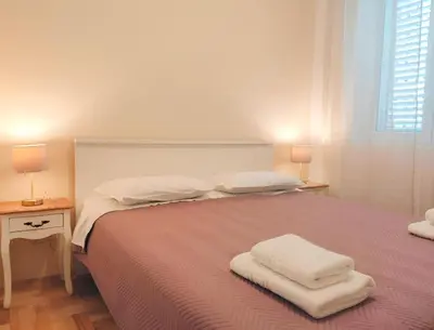 Krevet ili kreveti u jedinici u objektu Siesta Apartments