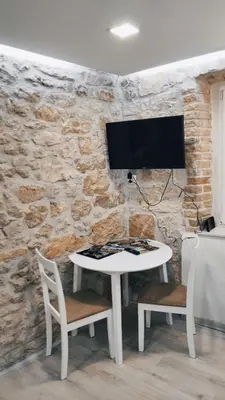 TV i/ili zabavni centar u objektu Falcons Nest