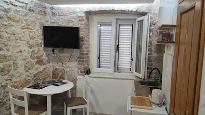 TV i/ili zabavni centar u objektu Falcons Nest