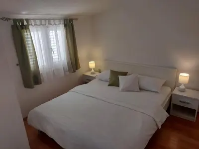 Krevet ili kreveti u jedinici u objektu Apartments Madlena