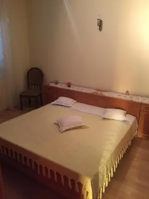 Krevet ili kreveti u jedinici u objektu APARTMAN FRANE 6+2