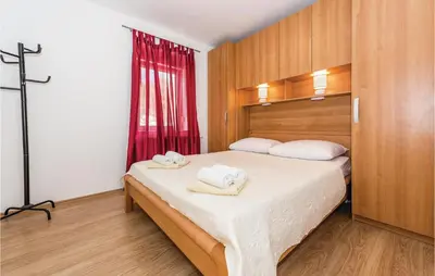 Krevet ili kreveti u jedinici u objektu Four-Bedroom Holiday Home In Primosten