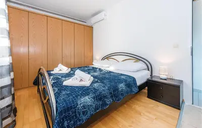 Krevet ili kreveti u jedinici u objektu Four-Bedroom Holiday Home In Primosten