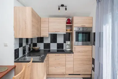 Kuhinja ili čajna kuhinja u objektu Apartments Polly